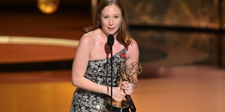 Hannah Einbinder accepts the Outstanding Supporting Actress in a Comedy Series Emmy for "Hacks" at the 77th Emmy Awards on Sunday, Sept. 14, 2025 at the Peacock Theater in Los Angeles. (Photo by Phil McCarten/Invision for the Television Academy/AP Content Services)