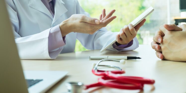 doctor and patient are discussing something.