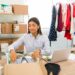 happy entrepreneur is shipping packages