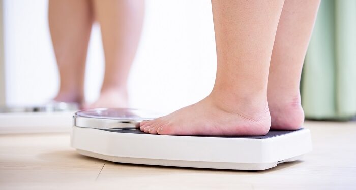 plus size girl measure weight