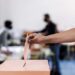 votar