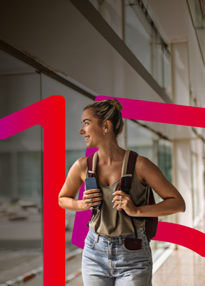 at the airport, a cheerful young woman carrying a backpack waits for her flight