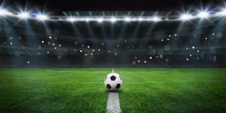 textured,free,soccer,field,in,the,evening,light, ,center,