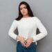 close up photo of depressed young woman with abdominal pain, loo