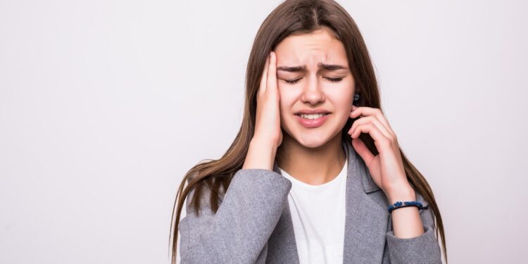 portrait of stressed businesswoman isolated over white background