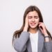 portrait of stressed businesswoman isolated over white background