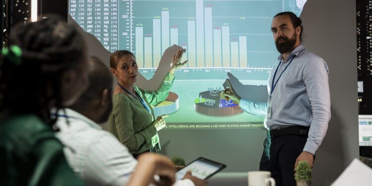 management team sharing insight on statistics in night corporation meeting