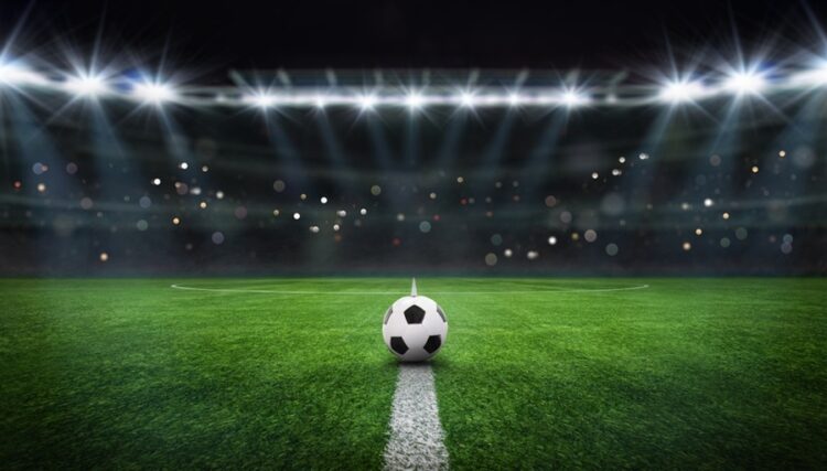 textured,free,soccer,field,in,the,evening,light, ,center,