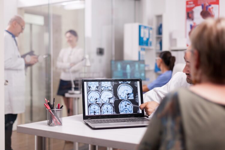 senior woman in hospital office